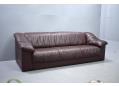 Danish long & low 3 seat sofa with brown buffalo leather. SOLD