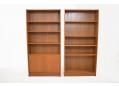 Danish design bookcases in teak with adjustable shelving & sliding doors..