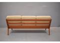 Teak sofa with 3 bar back support.Model 166 by Ole Wanscher