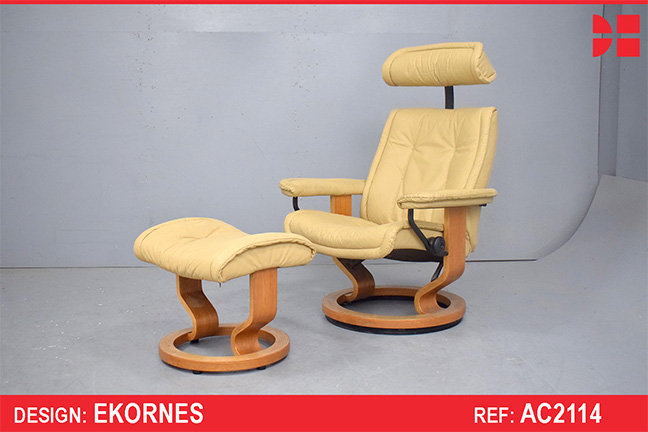 Ekornes reclining armchair and matching footstool in cream leather