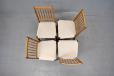 midcentury teak frame dining chairs in new cream upholstery produced 1960s by Mogens Kold