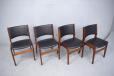 Stylish and comfortable set of 4 dining chairs with dark burma teak frames designed by Erik Buch