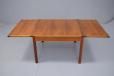 Midcentury danish design coffee table with 2 drop leaves in walnut, produced in the 1960s by Fredericia