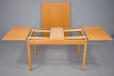 Modern beech dining table produced by A.B.J. Denmark extending wit 2 draw leaves