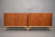 Vinatge teak locking cabinet base unit with brass handles and light oak legs designed by Borge Mogensen