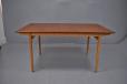 Vintage teak top dining table with oak legs produced by J o Carlsson 1960s 