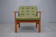 Moduline teak frame armchair produced 1963 by France and Son with green vinyl upholstery