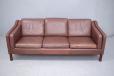 1970s box frame sofa in brown ox leather upholstery with feather filled cushions for sale