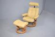 teak and cream leather reclining armchair with matching footstool for sale