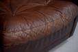 classic wing back armchair with foam cushions in original brown leather upholstery for sale