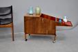 Vintage 1960s rosewood bar cart with red Formica interior produced by Silkeborg