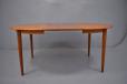 Oval extended top with 1 leaf added and making a 6 seater dining table