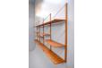 Vintage teak modular shelving system spanning 4 bays with 12 shelves for sale