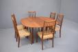 Vintage oval top dining table in teak extending with one extra leaf