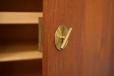 Vintage wall unit in teak with adjustable shelving top locking cabinet with brass handles in teak by Borge Mogensen