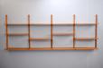 Modular Midcentury design shelving system in teak with brass shelf supports