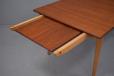 Swedish midcenture teak and oak dining table extendable to seat 8 comfortably