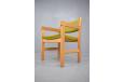 Vintage hans wegner design armchair in solid oak with green fabric upholstery