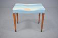 teak leg footstool in blue upholstery made by danish cabinetmaker