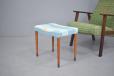 Vintage teak footstool with blue upholstery for sale