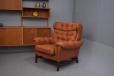 High back wing chair in vintage terracotta colour ox leather