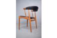 Model BA113 dining chairs in teak with black vinyl uphostery designed by Johannes andersen