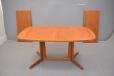 Teak dining table with oval top and 2 self-stored leaves made by GUDME MOBELFABRIK 