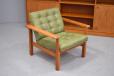 Vintage teak moduline armchair in teak with green vinyl upholstery for sale