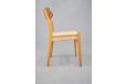 Model CH23 dining chair in teak and oak with woven papercord seat for sale