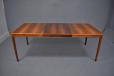 Henry W Klein design dining table in rosewood extendable to seat 8