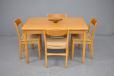 Danish design beech dining table extending with 2 draw leaves for sale