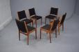 Stylish Danish design dining chairs with gently curved high back support.