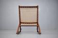 midcentury design teak frame rocking chair produced by danish cabinetmaker