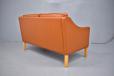 Tan colour ox leather upholstered 2 seater box frame sofa designed and produced by Mogens Hansen