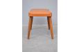 Occasional footstool in tan vinyl upholstery - view 5