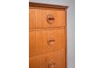 vintage teak chest of drawers with locking top drawer and matching grain facing across all drawers