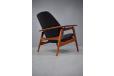 Exclusive pair of Arne hovmand olsen design teak armchairs with original black vinyl upholstery.