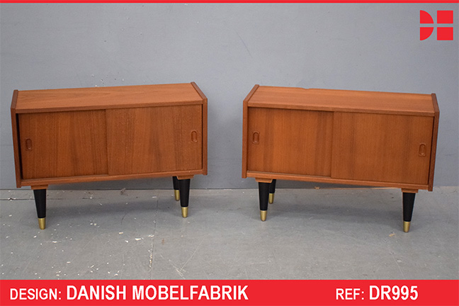 Pair of vintage teak bedside cabinets with sliding doors