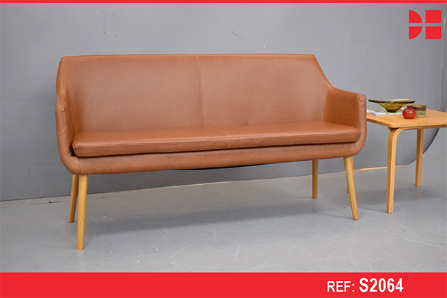 Modern shallow-frame bench sofa in brown leather