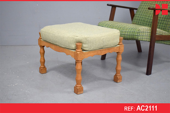 Light oak footstool with pale green upholstery