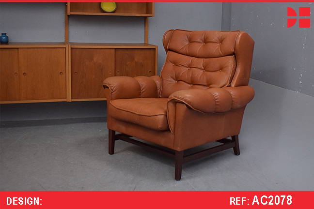 Vintage wing chair in terracotta colour ox leather